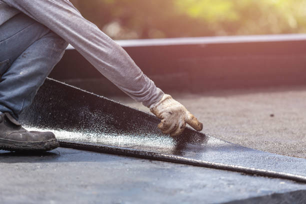 Professional Exterior Waterproofing technician working in White Cloud, MI